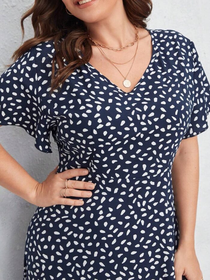 SHEIN GRANDE TAILLE (44/46/48/50/52/54) – Robe maxi fluide noire à imprimé intégral et ourlet à volants E183 https://sheinstyle.store original Algerie DZ