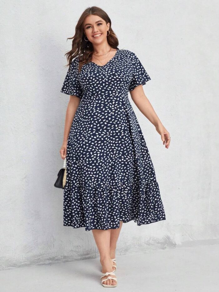 SHEIN GRANDE TAILLE (44/46/48/50/52/54) – Robe maxi fluide noire à imprimé intégral et ourlet à volants E183 https://sheinstyle.store original Algerie DZ
